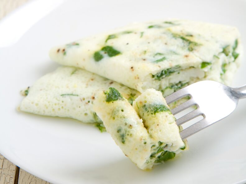 Classic protein omelette with herbs in the diet with eggs for weight loss